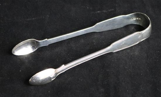 A pair of Victorian silver fiddle and thread pattern sugar tongs, three cased sets and a set of ten sterling silver coffee spoons.